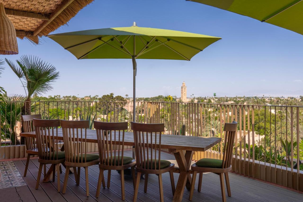Hotel Jadali & Spa Marrakesh Exterior foto A patio umbrella